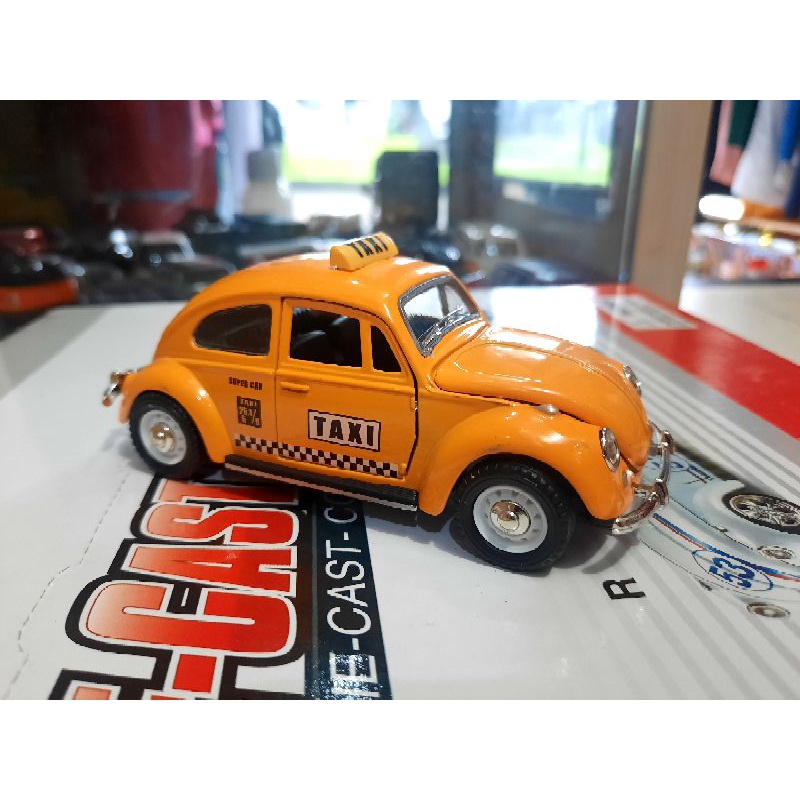 Miniatura Volkswagen Fusca Taxi De Ferro Shopee Brasil