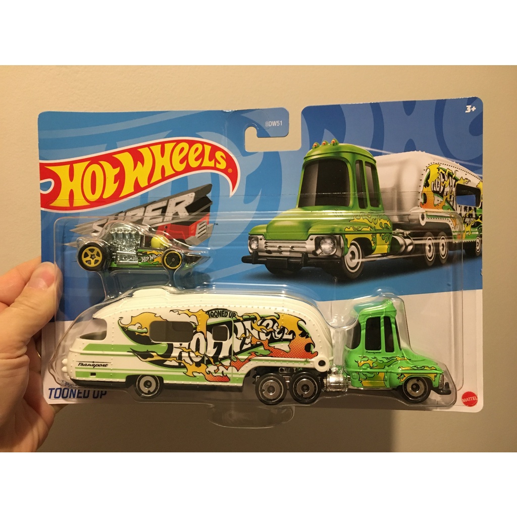 Hot Wheels caminhão carreta trailer carrega carrinho e carro de corrida fórmula 1 F1 Shopee Brasil