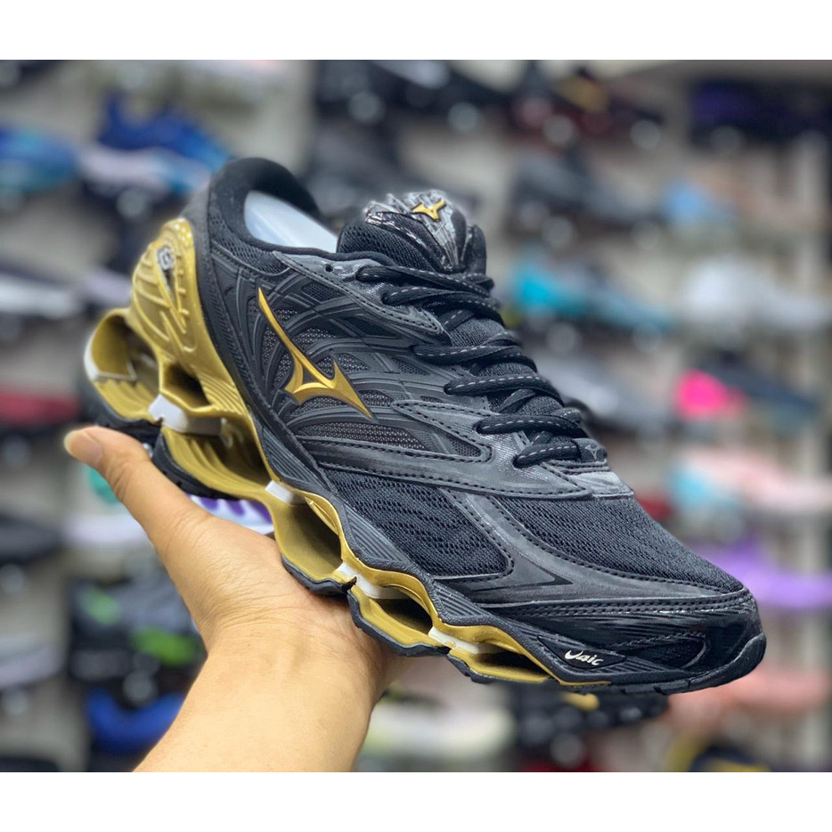 Mizuno preto hotsell e dourado