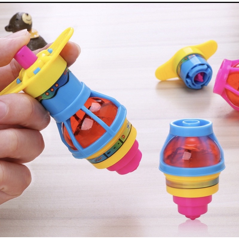 Pião De Brinquedo Infantil Com Lançador - Compre Agora - Feira da Madrugada  SP