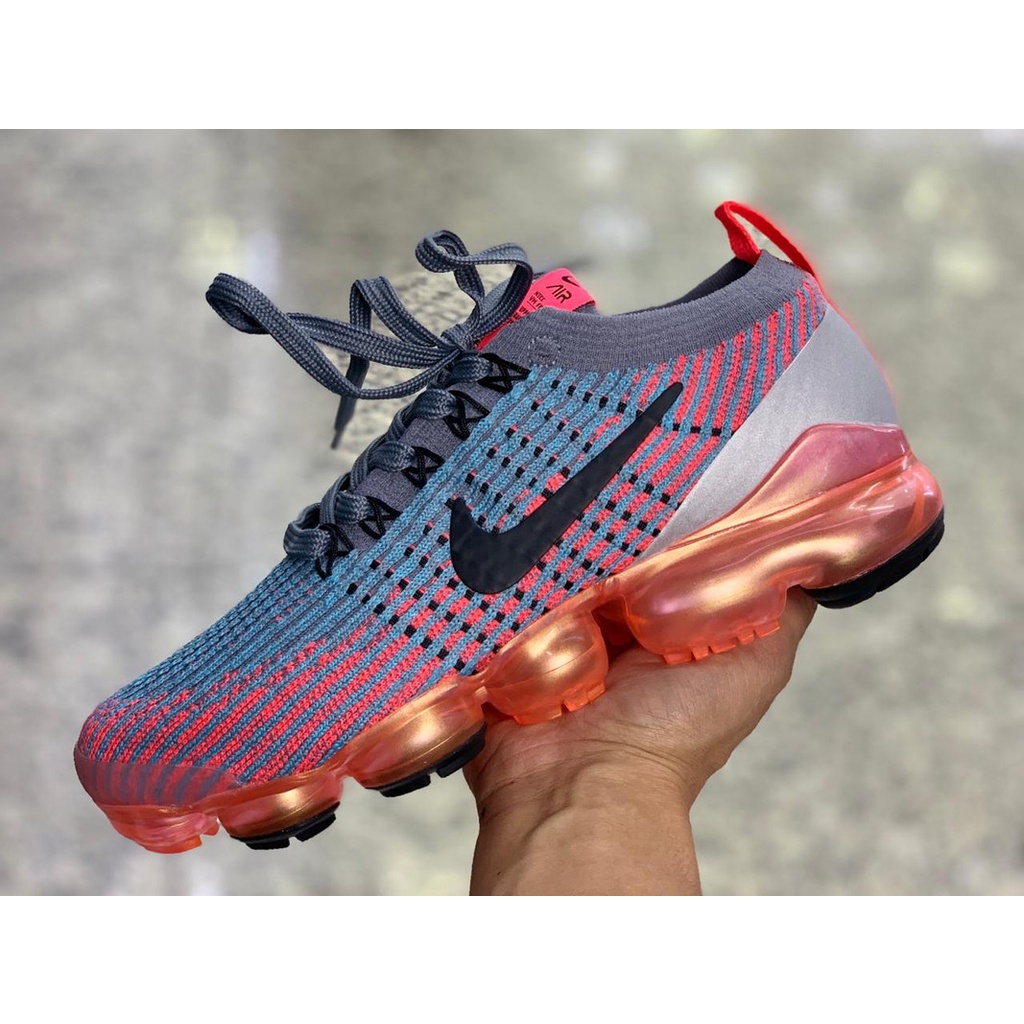 Vapormax orange hot sale blue