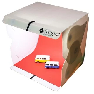Pop Up 45 expansível o mini estúdio fotográfico portátil de 45 cm da Mutu, com iluminação LED extra forte e fundos infinitos, ideal para fotografia de produtos.