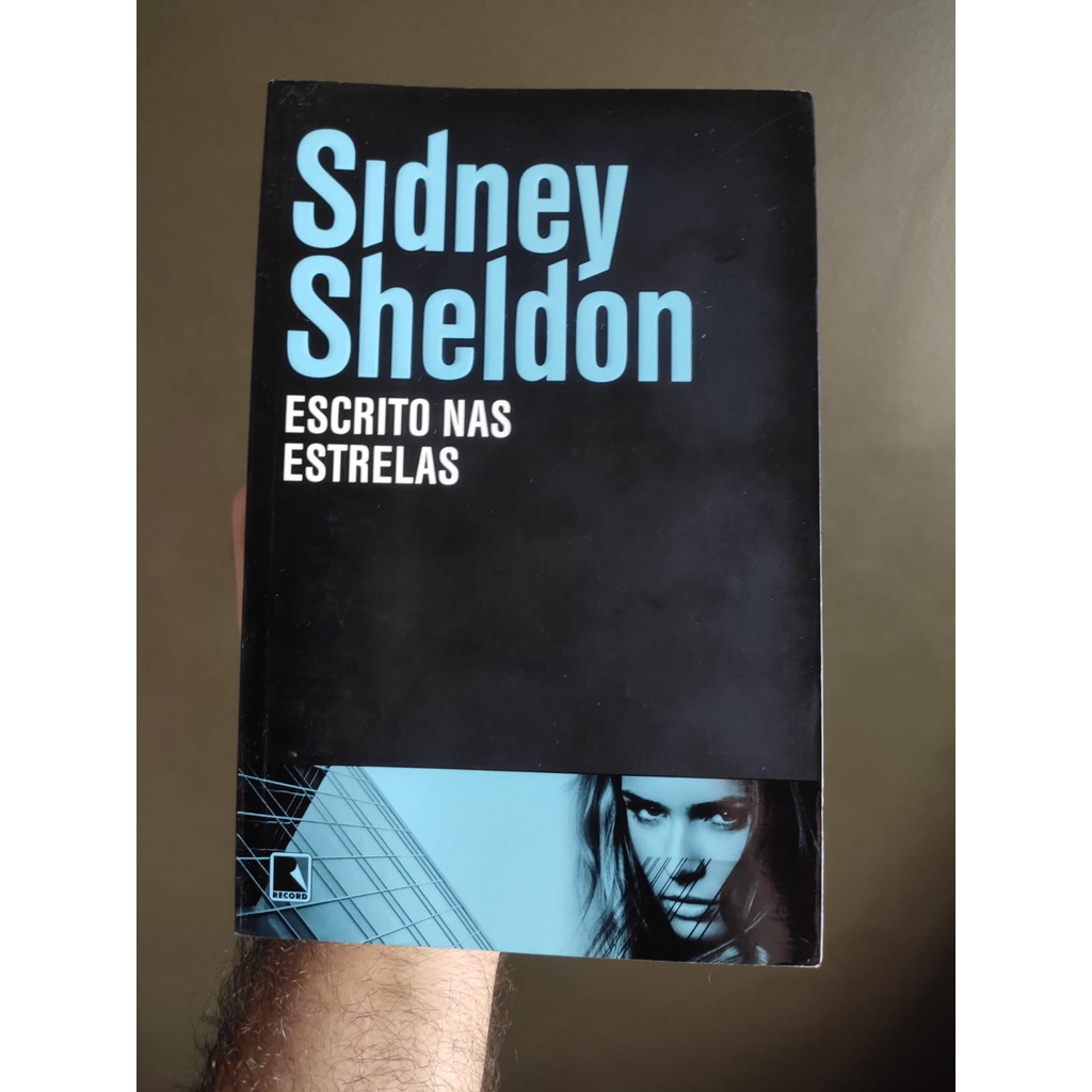 Escrito nas estrelas - Sidney Sheldon | Shopee Brasil