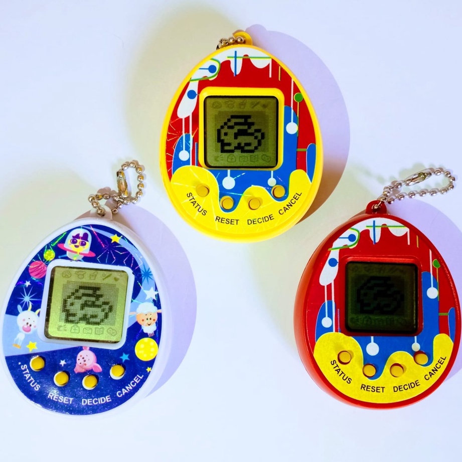 BRINQUEDO BICHINHO VIRTUAL / TAMAGOTCHI COM CORDINHA - XH9820