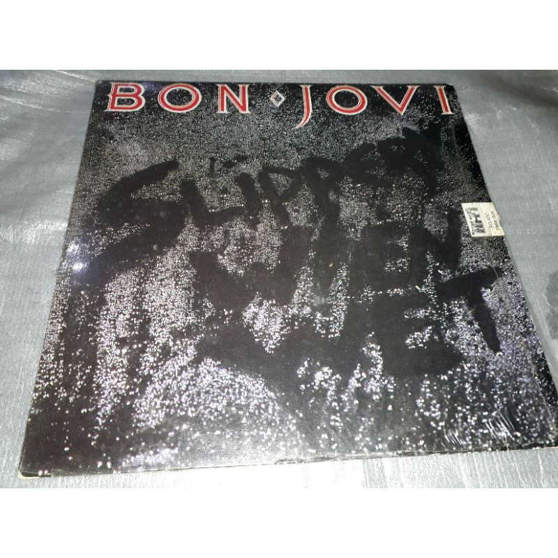 欧LP Bon Jovi Slippery When Wet 060257029218 Mercury, Universal M /00260 LP BON JOVI - SLIPPERY WHEN WET 1986 MERCURY COM ENCARTE VINIL