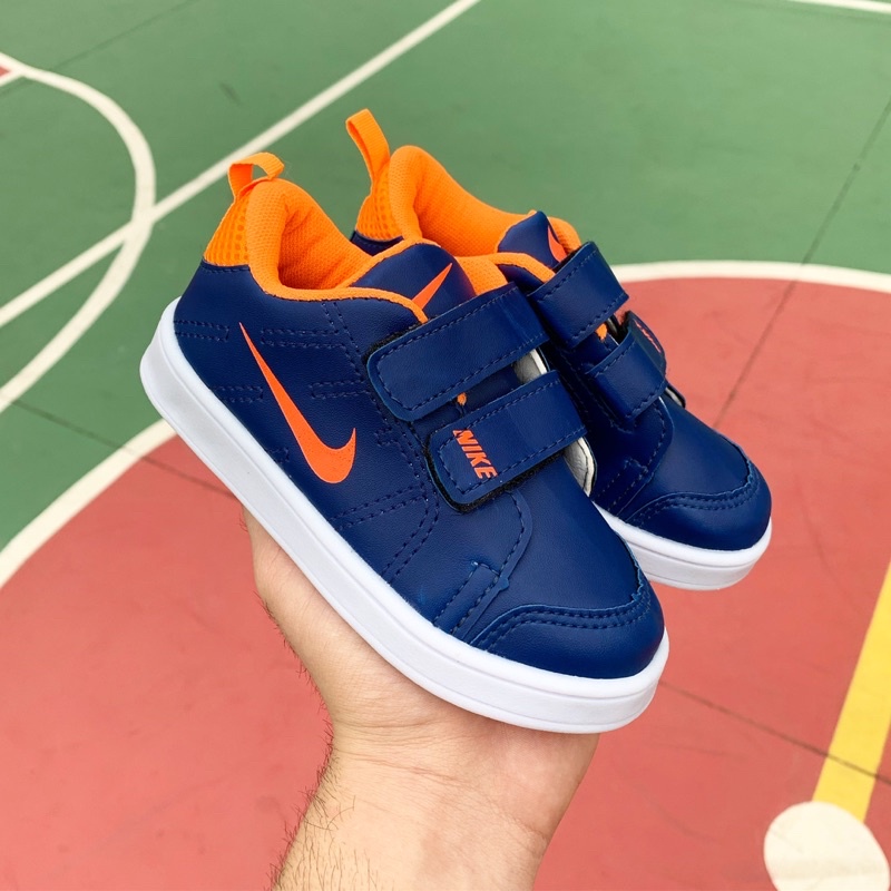 Tenis nike infantil 2024 azul e laranja