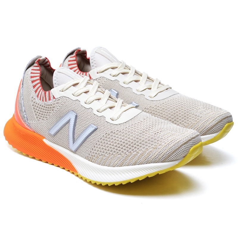 New balance store cinza e laranja