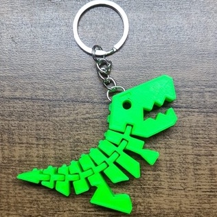Chaveiro 2 em 1: Jogue e carregue suas chaves com este chaveiro dinossauro!  - Bem Cortado Papelaria Fofa: Materiais Escolares Divertidos e Diferentes