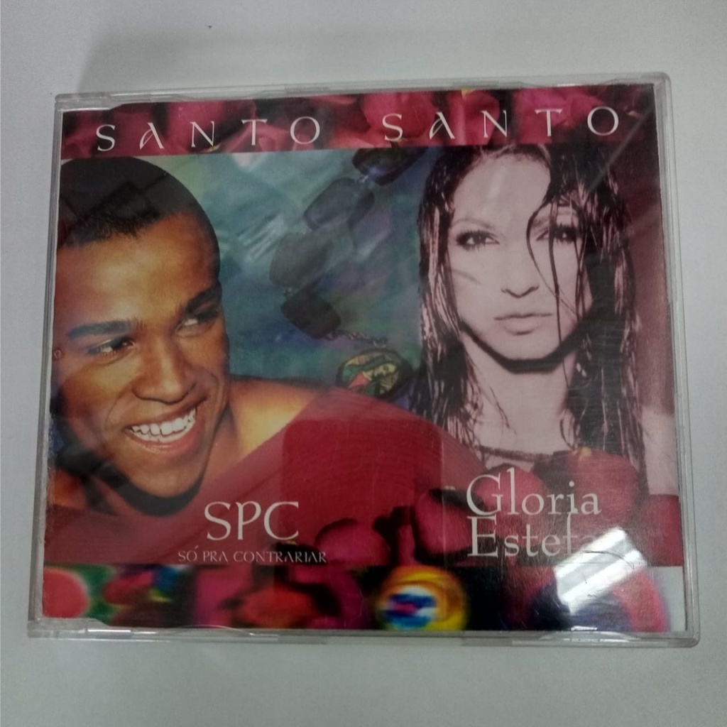 Box CD SPC Só Pra Contrariar incluindo santo santo Dueto com Glória Stefan  edição limitada 10 anos Só Pra Contrariar contendo 2 CDs + luva papelão de  proteção produto raríssimo lacrado de