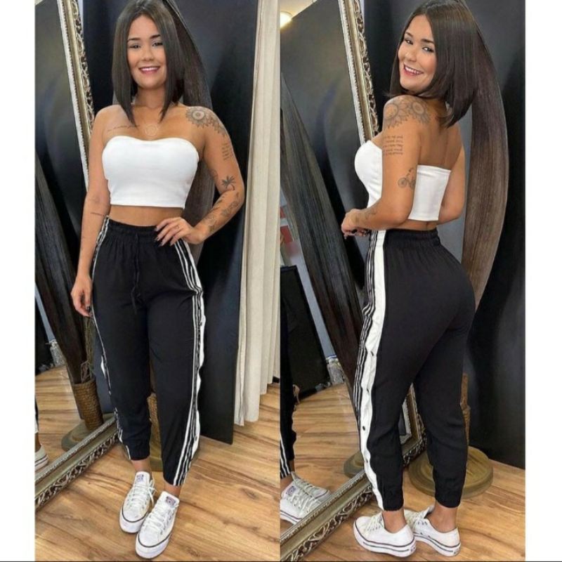 Calça pantalona com fenda listras e hot sale botões laterais