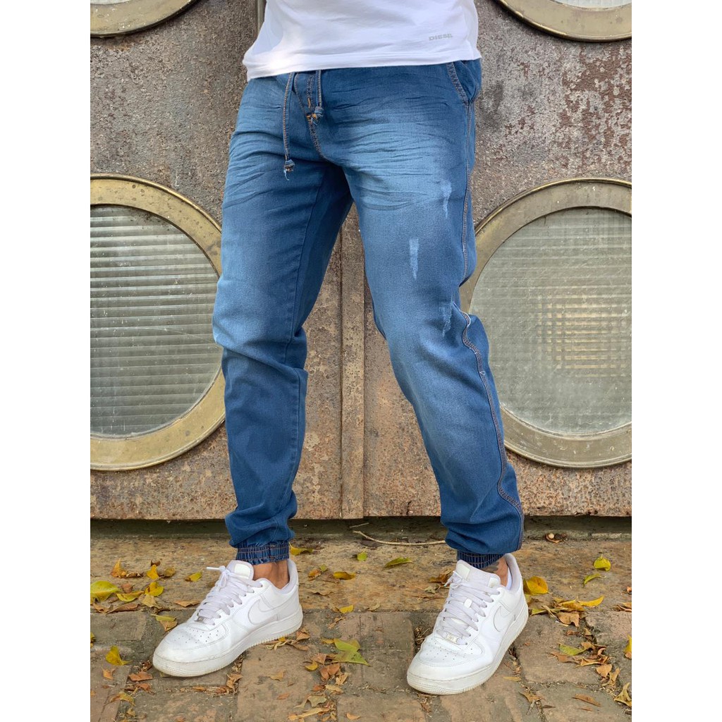 Calça jeans manchada store masculina