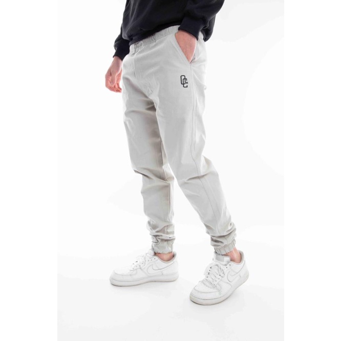 Calça Jogger Overcome Logo Bege