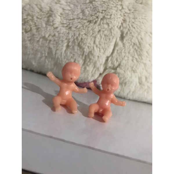 Bebés de plástico miniatura hotsell