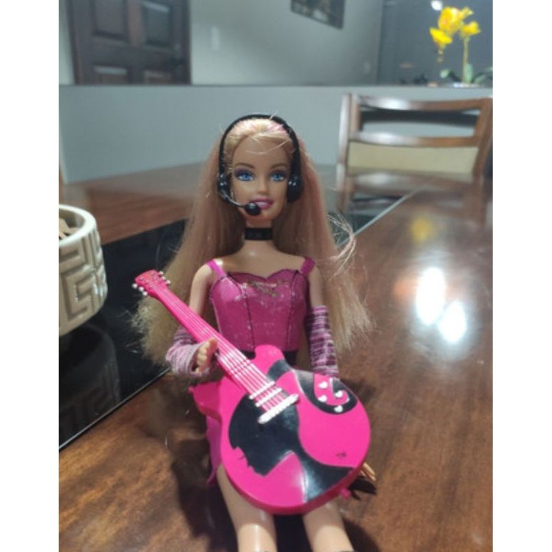 boneca barbie roqueira