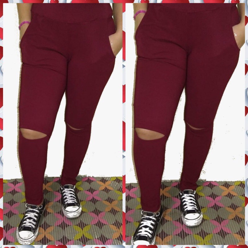 Calça legging com rasgo no joelho e cintura alta.