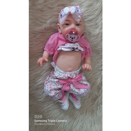 Boneca Bebe menino,2255cm Bebê Reborn de silicone original,Olhos abertos  reborn baby realista com genitales traje azul garrafa, chupeta silicone  sólido molinho corpo inteiro lavável,Loiro : : Brinquedos e  Jogos