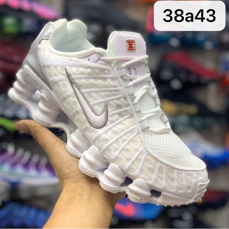 Nike shox branco hot sale e dourado masculino