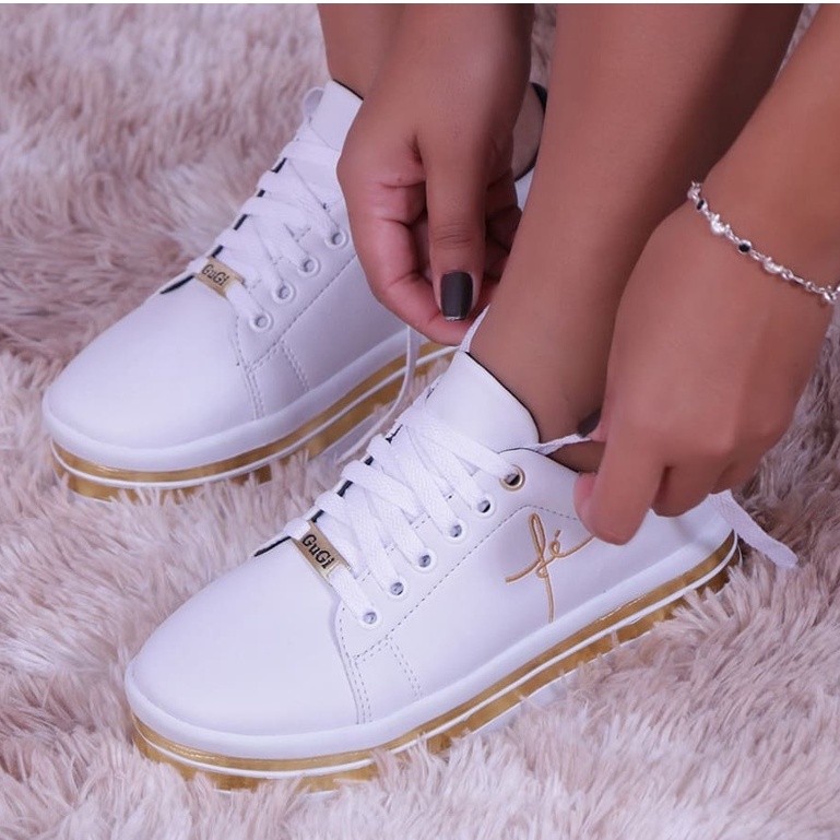 Tenis dourado e hot sale branco