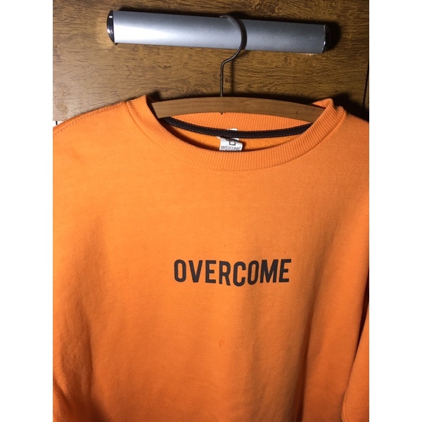 Moletom store overcome laranja