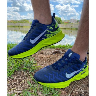 Tenis nike azul hot sale e verde limao