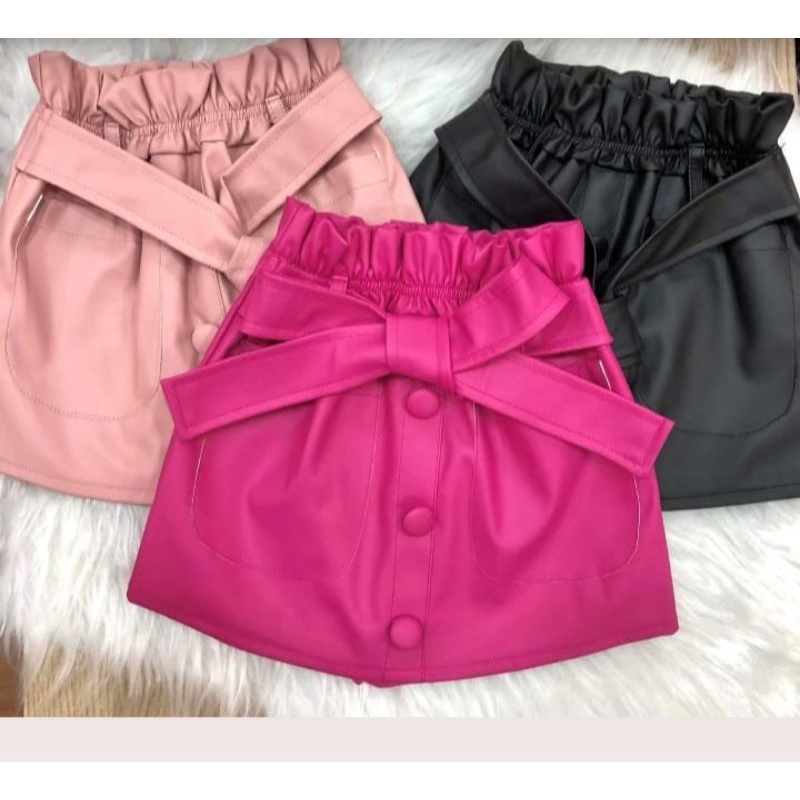 Saia de store couro rosa bebe