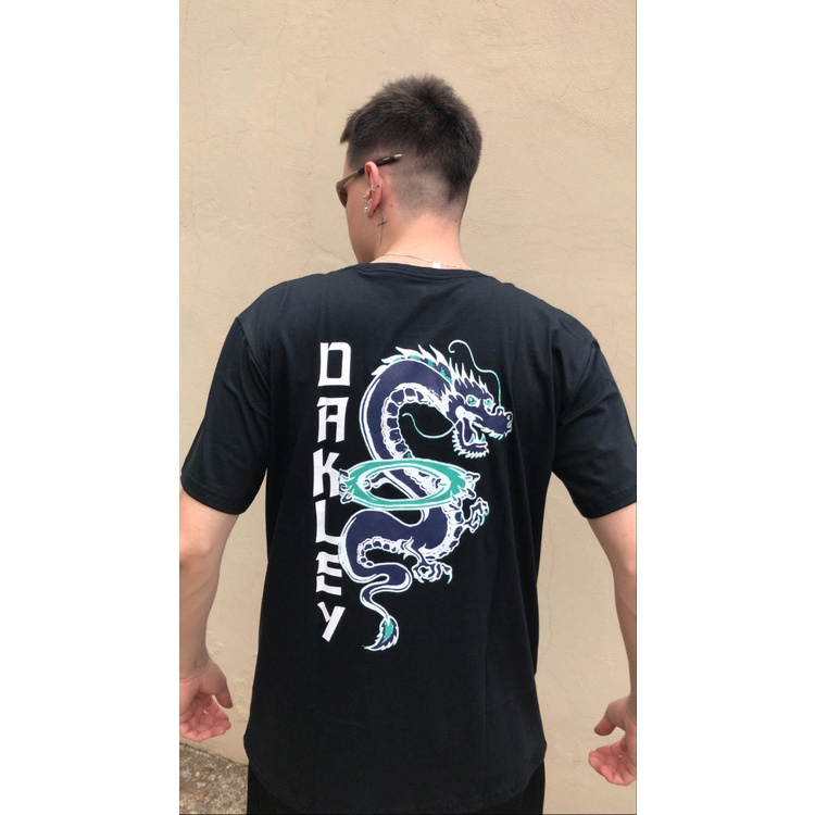 Camiseta Oakley The Dragon Tattoo Bege - Compre Agora