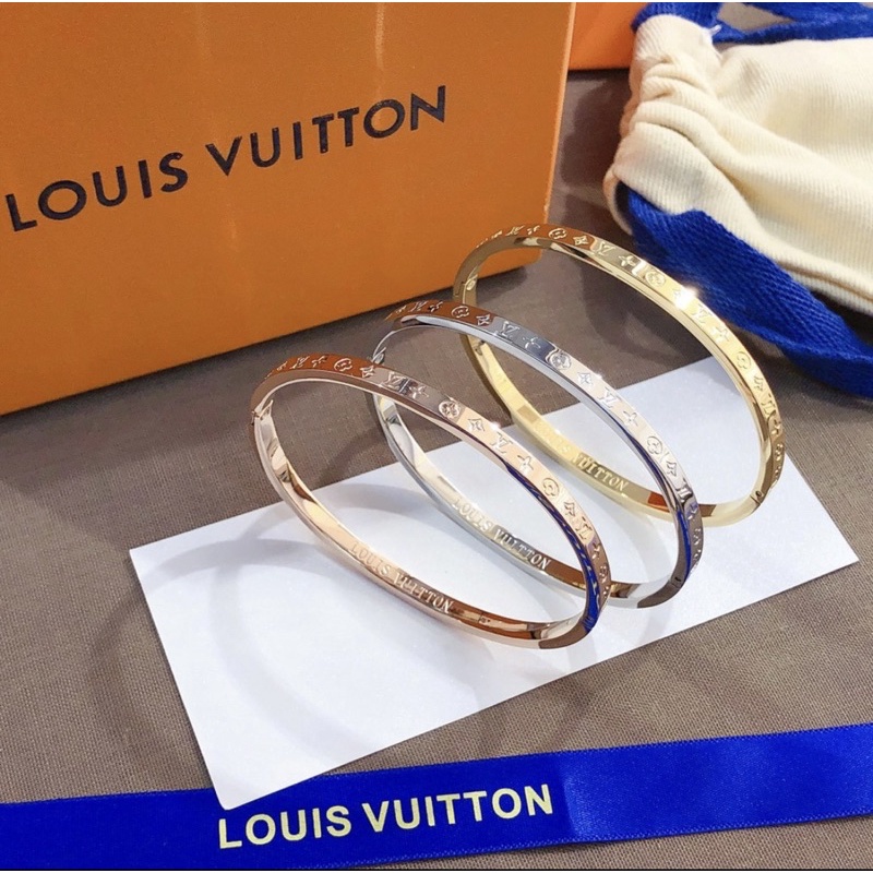 LV / Pulseira Louis Vuitton de Aço / Artigo de Luxo / Pulseira LV de Aço  com detalhes Crivados.