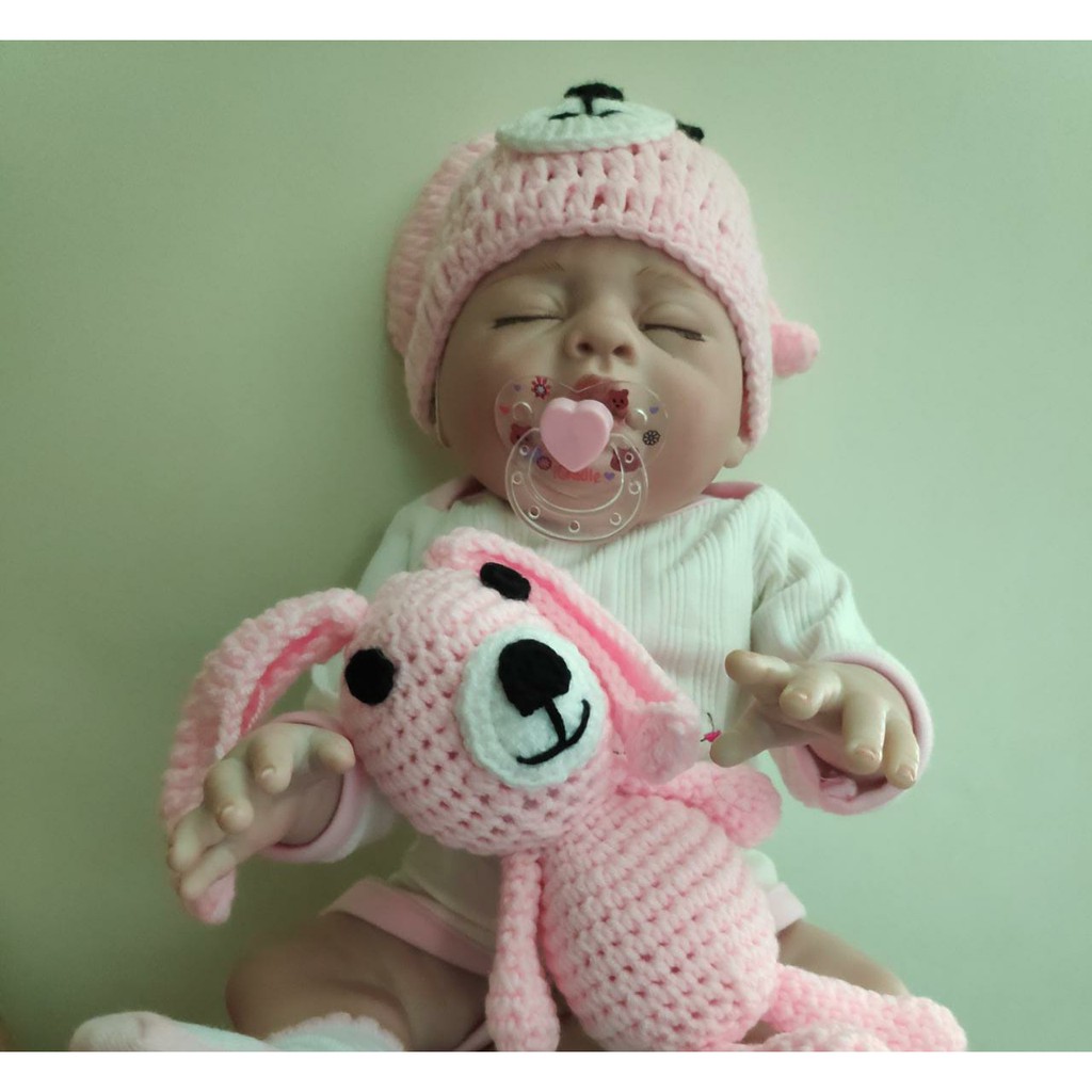 Boneca Bebé Reborn 55cm em Vinil com acessórios, recém nascido, olhos  fechados, receba em 3 dias uteis
