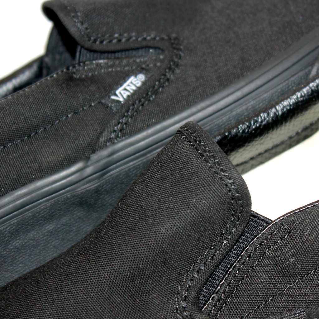 vans black black slip on