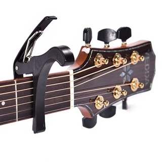 Capotraste Braçadeira Pestana Guitarra Violão Aço E Nylon Baixo, Ukulele em Oferta na Shopee