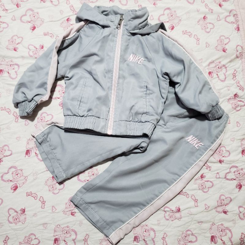 Corta vento nike rosa bebe clearance e branco