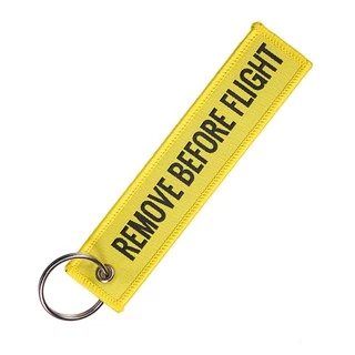 Chaveiro Remove Before Flight Amarelo - Produto Original