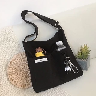 bolsa feminina transversal /bolsa lona/com chaveiro/com ziper