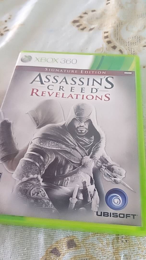 Jogo Assassins Creed Revelations para Xbox 360 - Mídia Física Original -  RIKATECH