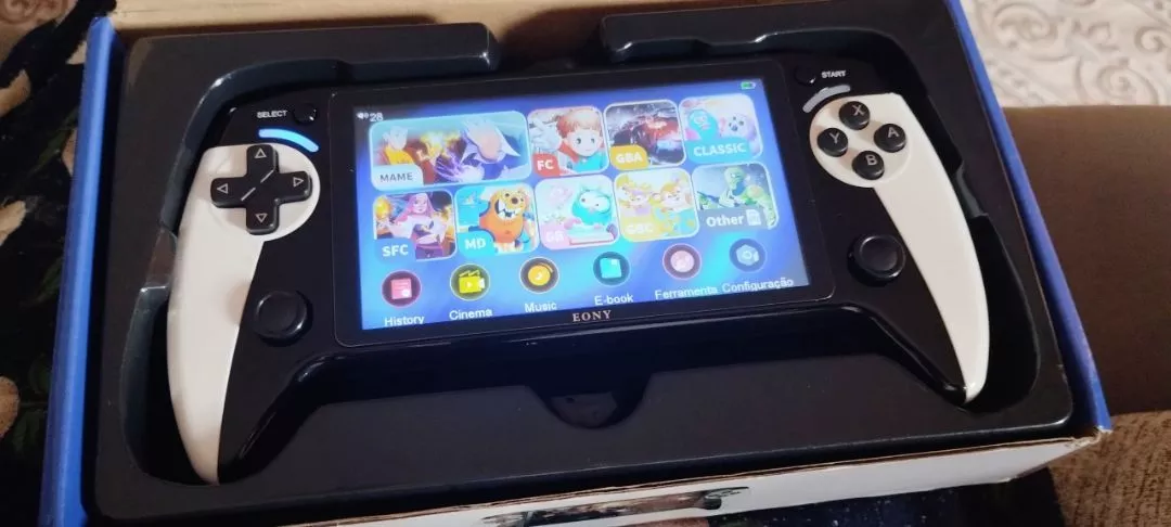 Console portatil Eony Black Hawk dentro da caixa original com menu de jogos visivel