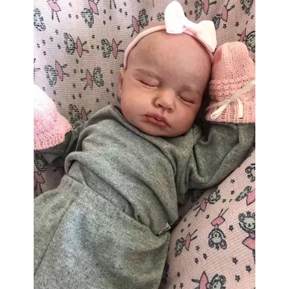 Bebê Reborn Boneco Menino Realista Stitch Original Corpinho Em Silicone Com Bolsa Maternidade