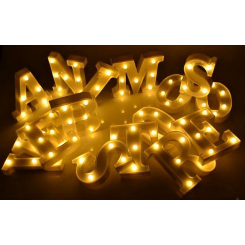 Luminárias formato letra Shopee Brasil