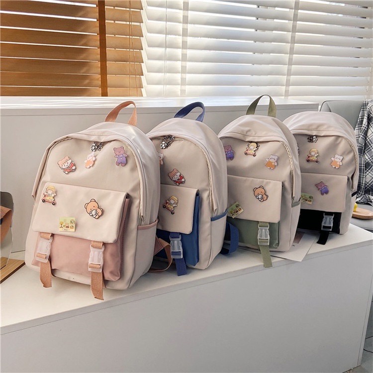 Bolsa Mochila Menina Feminina Costas Estilo Coreana Estilosa Moderna Com Acessórios Pequena Pins Broches fofos Jovem