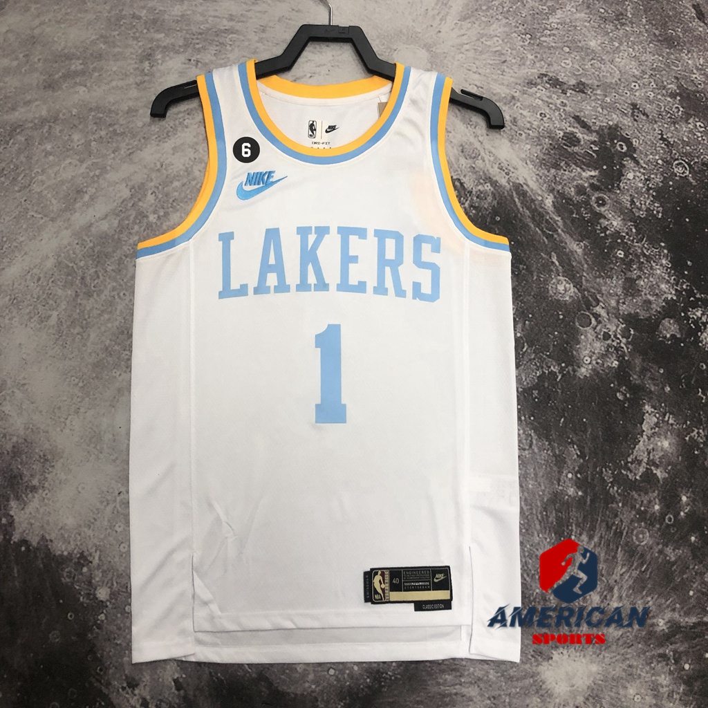 D'Angelo Russell Los Angeles Lakers Unsigned Dribbling in White Jersey Photograph