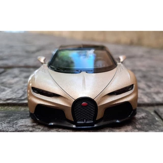 Miniatura Bugatti Chiron Super Sport 1:38 Kinsmart Preto/Dourado.