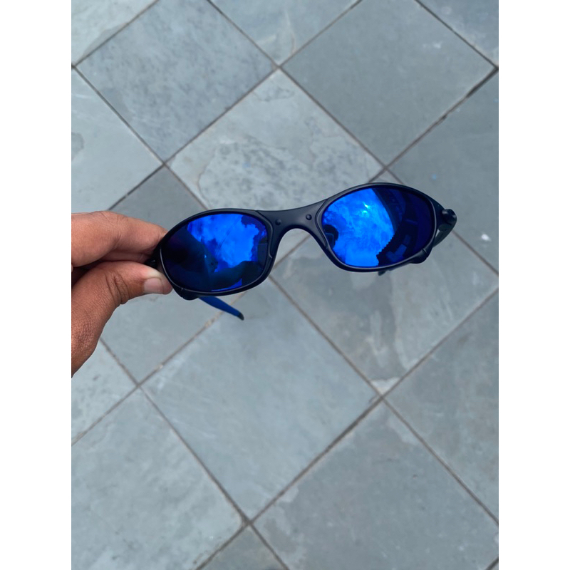 ÓCULOS DE SOL OAKLEY JULIET - LENTE AZUL DARK BLUE ARMAÇÃO CINZA oakley  9025DB1