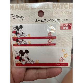 Etiqueta colante com ferro do Mickey