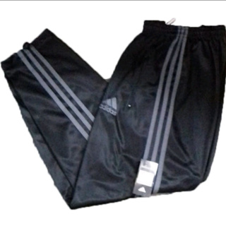 Calça adidas Tiro Woven Loose 7/8 Mulher Preto