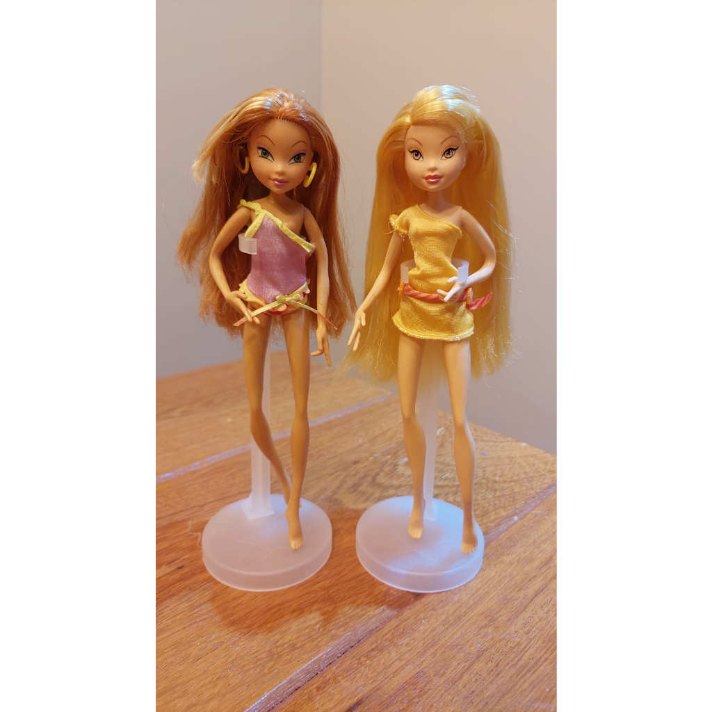 Bonecas Clube das Winx Flora e Stella praia (cada)