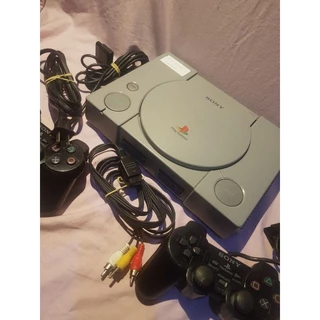 Playstation 1. Não está lendo. Dois controles. Leia