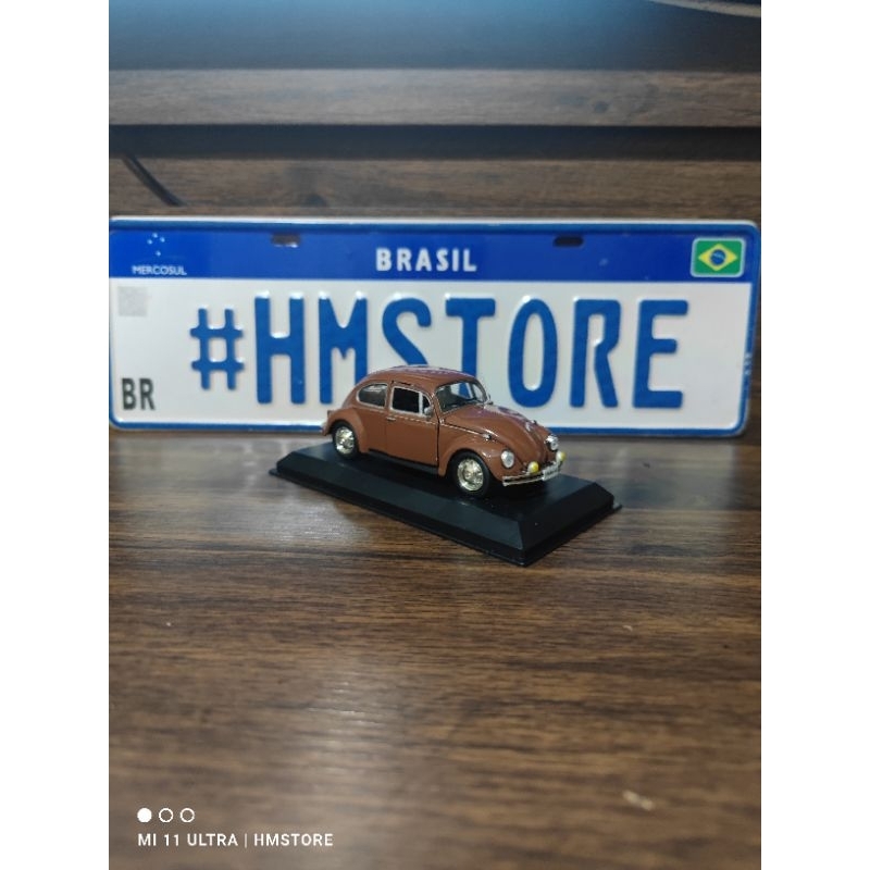 MINIATURA FUSCA MARROM CARAVELAS 1/32( leia a descrição,)