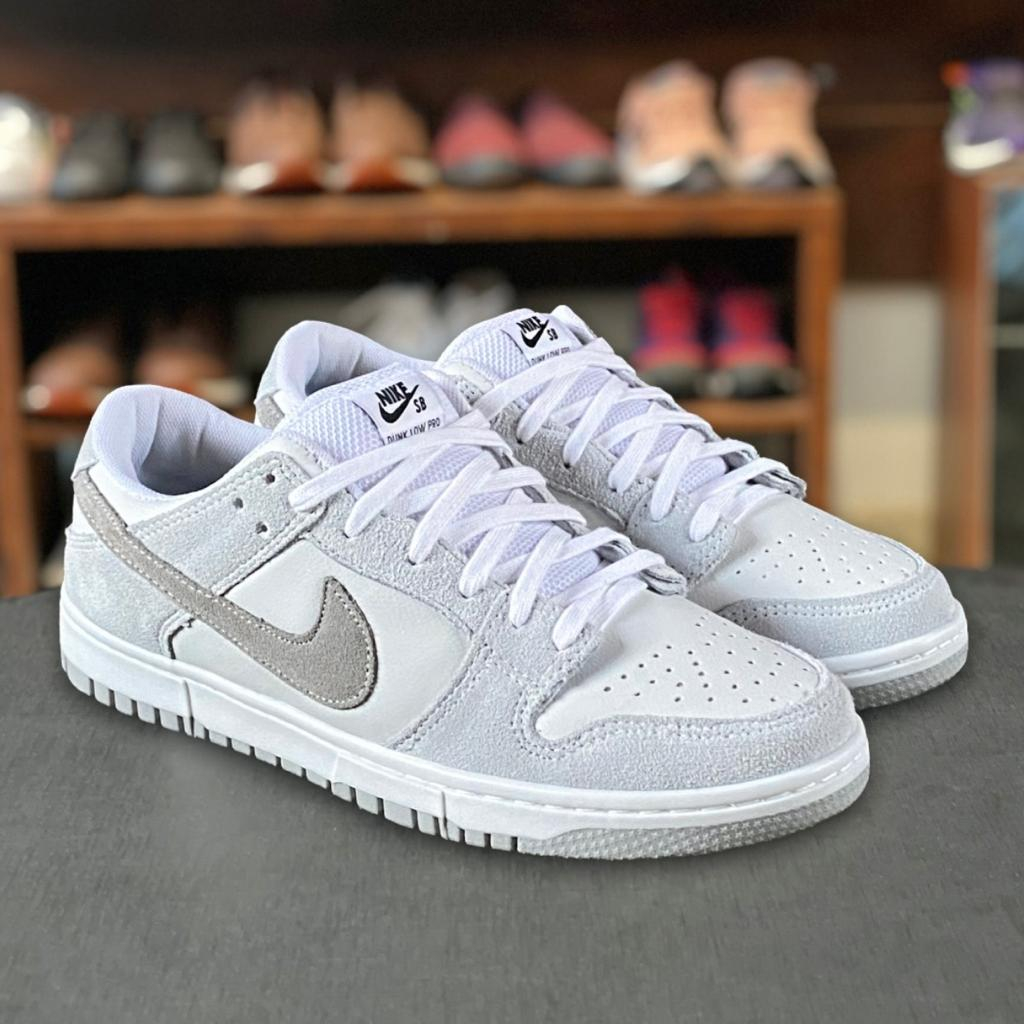 Tenis nike hot sale branco baixo