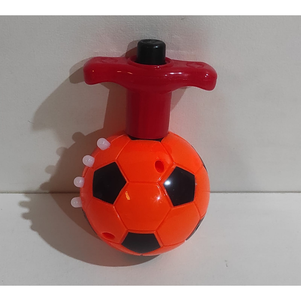 Brinquedo Peão Musical Bola De Futebol c/ Lançador C/luz E S em Promoção na  Americanas