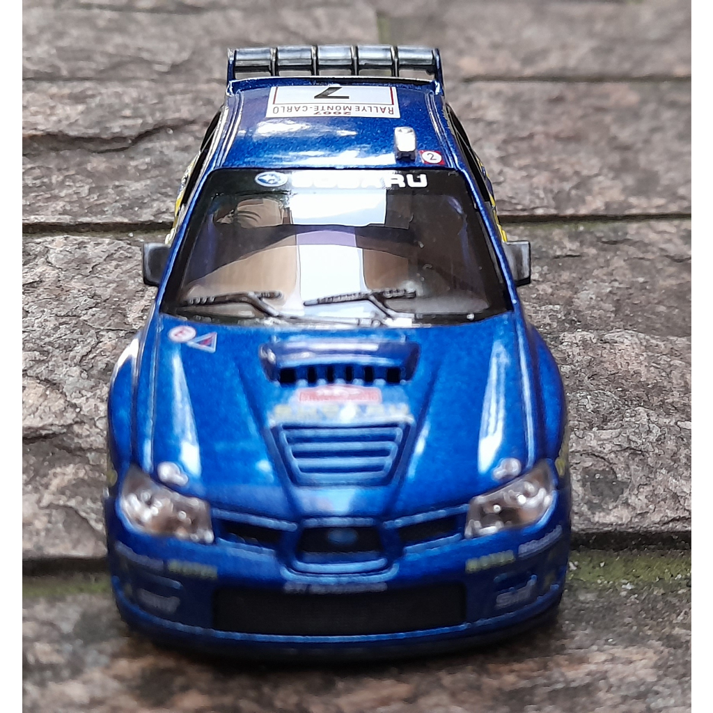 Miniatura Subaru Impreza WRC 2007 Azul Onix 1/36 Metal e fricção.