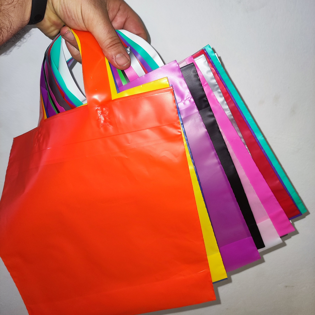 25 Sacolas plásticas Alça Fita tamanhos 27x30 , 30x35 e 40x40 em Alta Densidade para lojas.